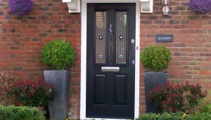 Black composite door and white frame