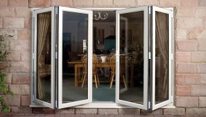An open white uPVC bifold door