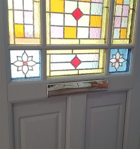 Interior view of a white uPVC Victorian entrance door