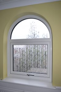 Shaped white upvc window