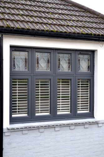 Anthracite Grey Flush windows with encapsulated glass design